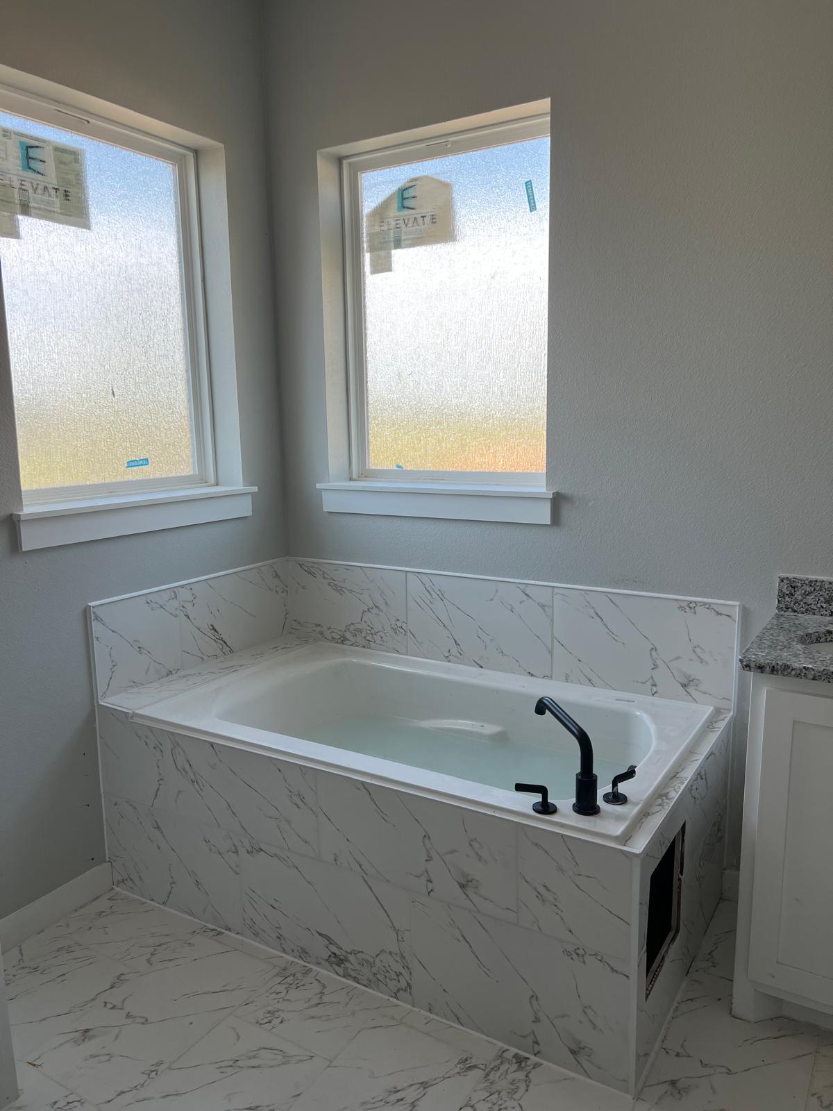 Marble look shower tile project 16